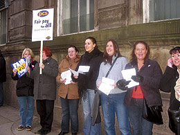 PCS members on picket duty outside the magistrates courts on 20th December 2005