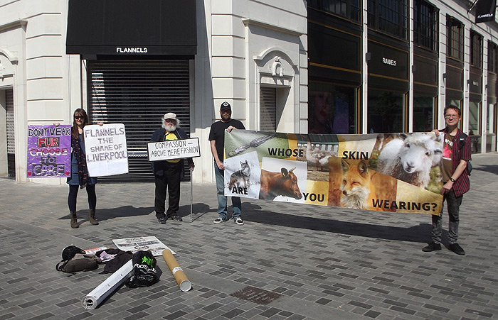 Protest against Flannels sale of real fur on the day its huge new department store opens